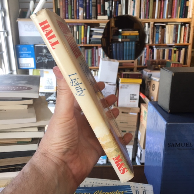 Lightly. First Edition in dustjacket, Signed
