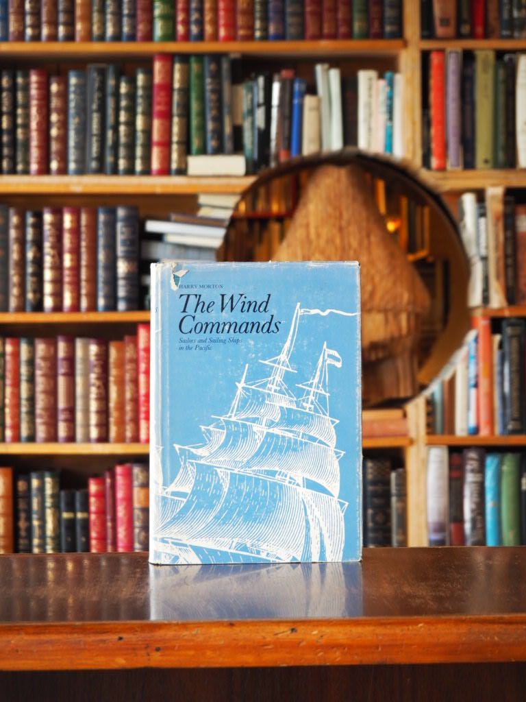 The Wind Commands : Sailors and Sailing Ships in the Pacific. First American Edition in dustjacket