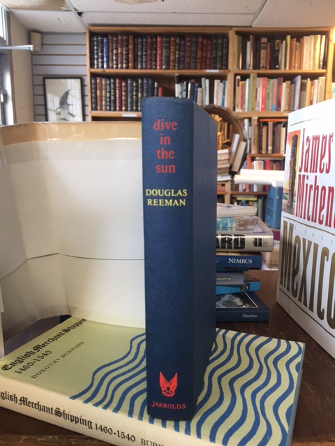 Dive in the Sun. First Edition in dust jacket. Signed